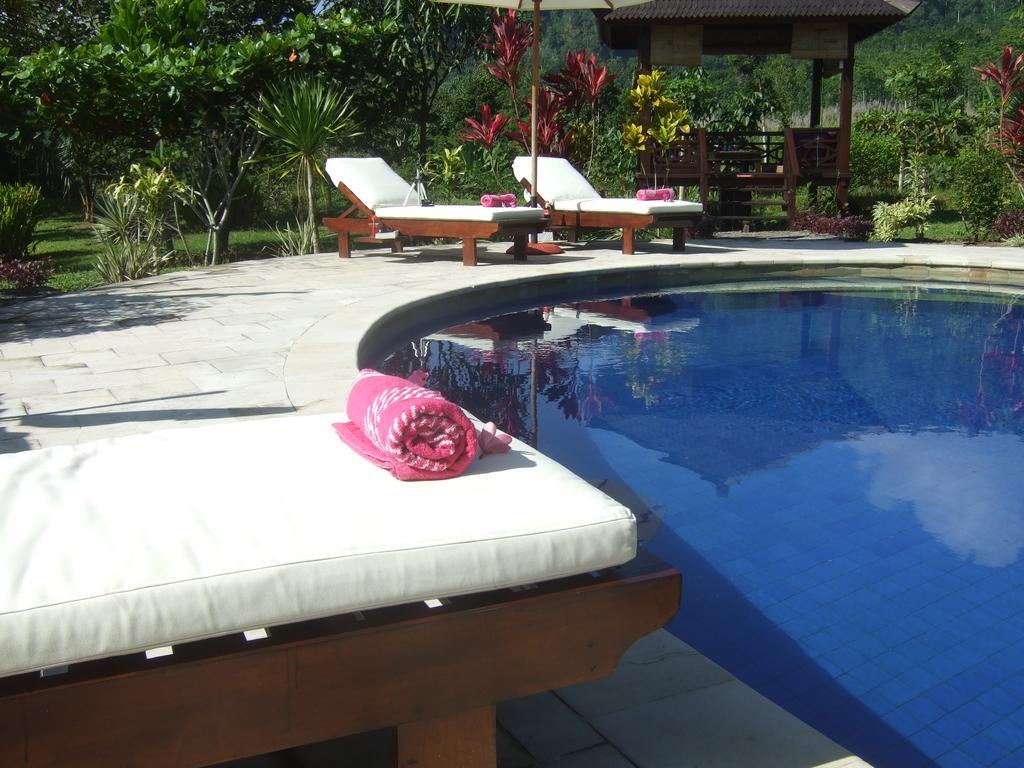 Guesthouse Rumah Senang Kalibaru Esterno foto
