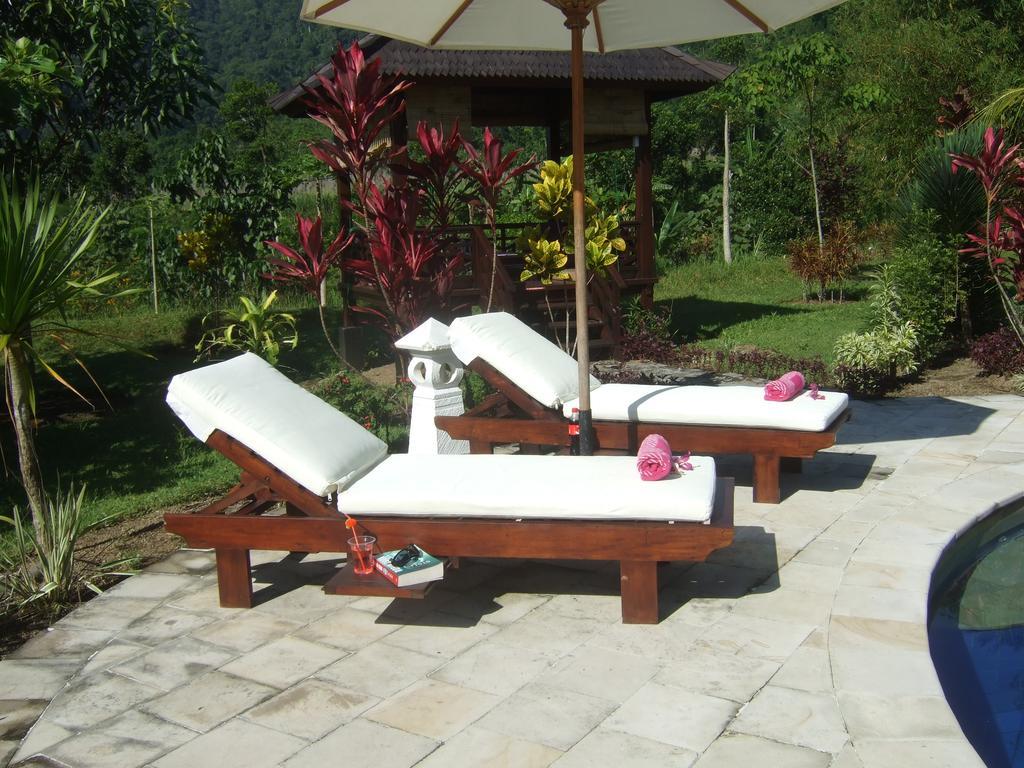 Guesthouse Rumah Senang Kalibaru Esterno foto